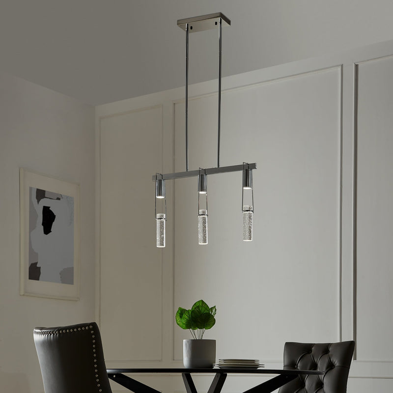 3 Light Finesse Decor Harmony Chrome Chandelier over a Dining Room table in a modern space