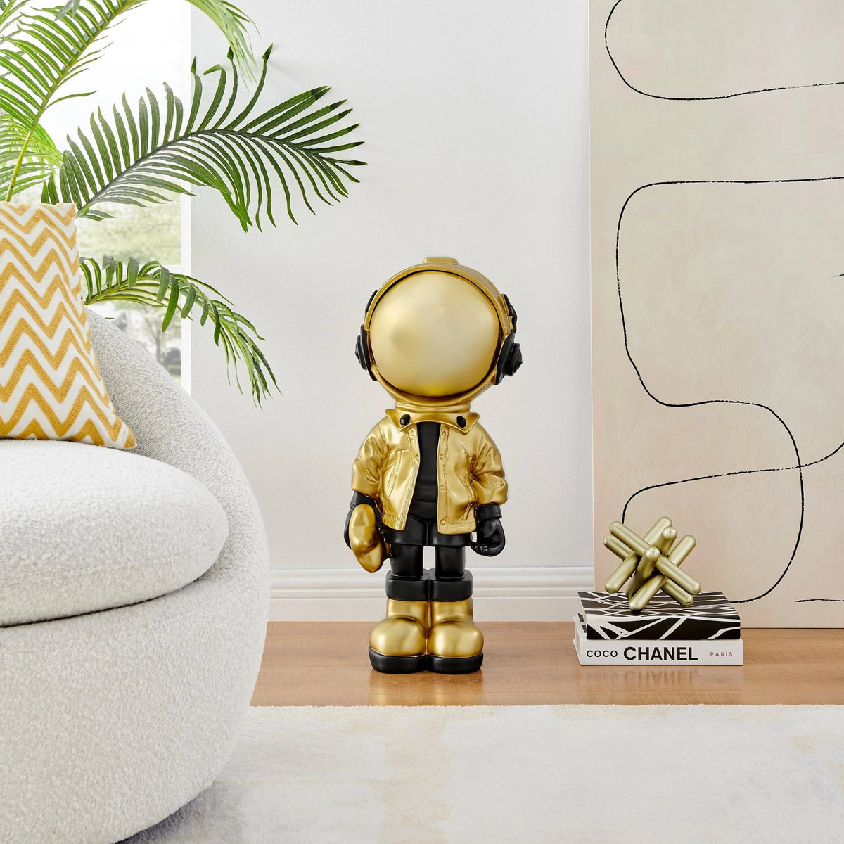 Hubble Takes the Stars Astronaut Sculpture in Black & Gold / 30" Tall