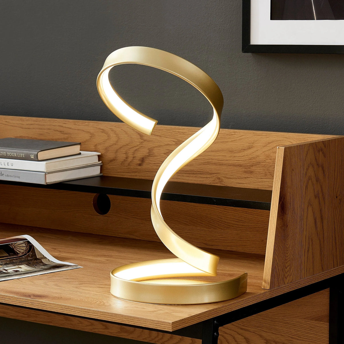 The Hamburg Chrome Table Lamp is available in Gold.
