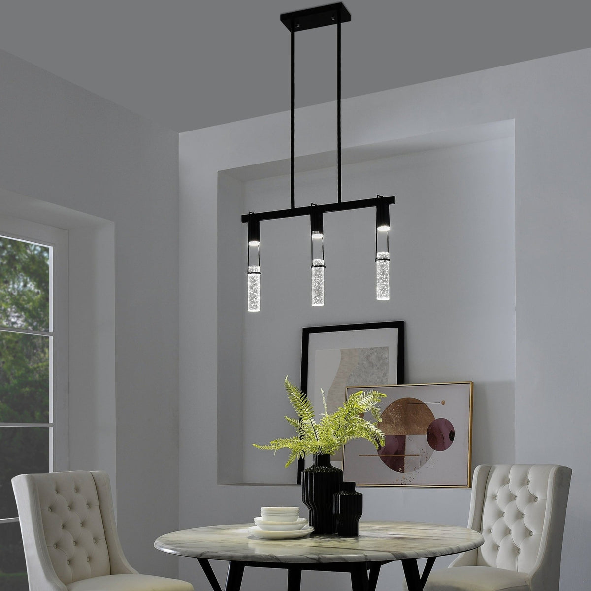 Harmony Black Chandelier with 3 sparkling lights over a dining room table in a modern setting