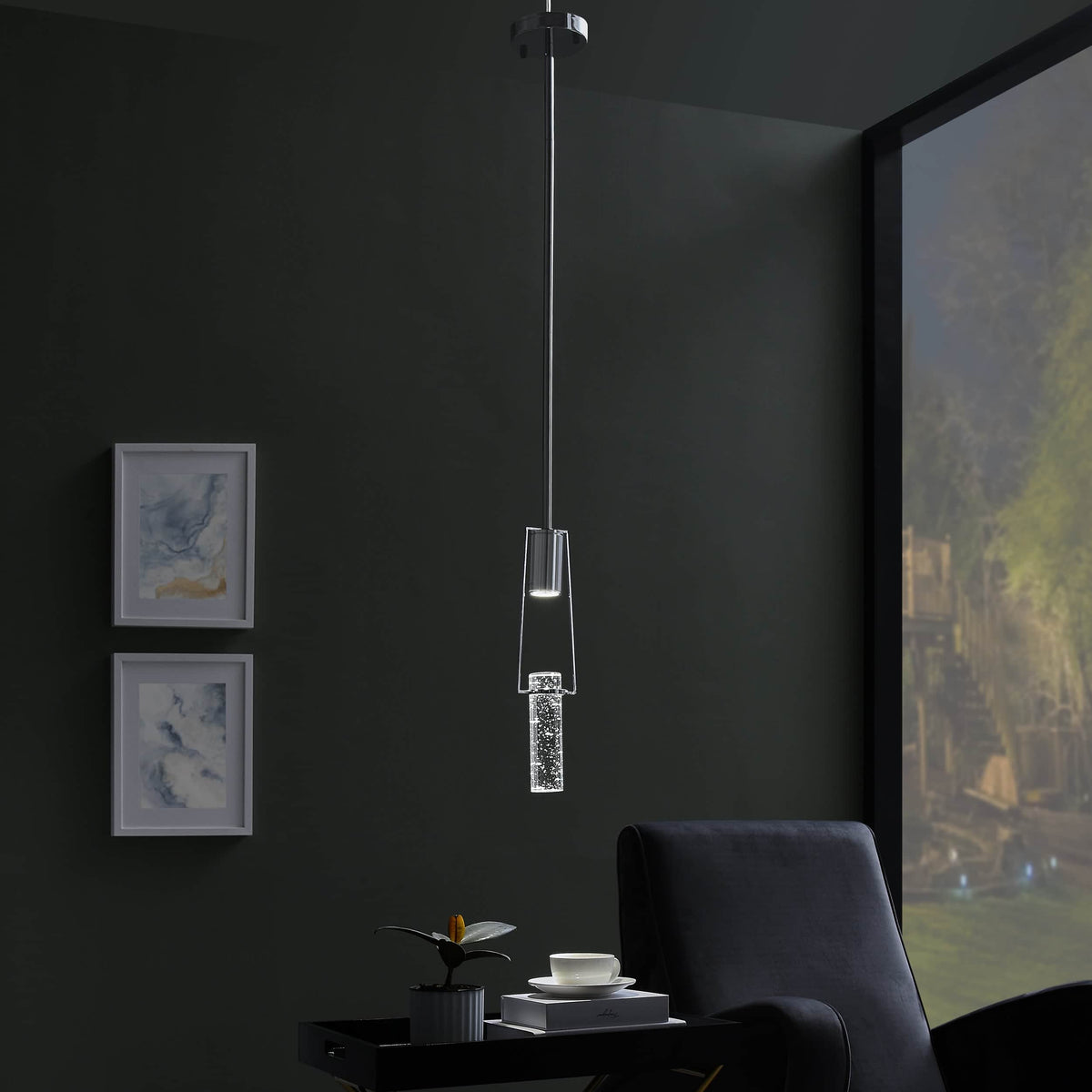 Harmony Single Chrome Pendant light used over side table for reading